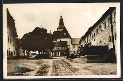 AK St. Peter am Wimberg, Strassenpartie mit Kirchturm