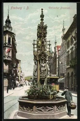 AK Freiburg i. B., Gotischer Brunnen mit Strassenbahn