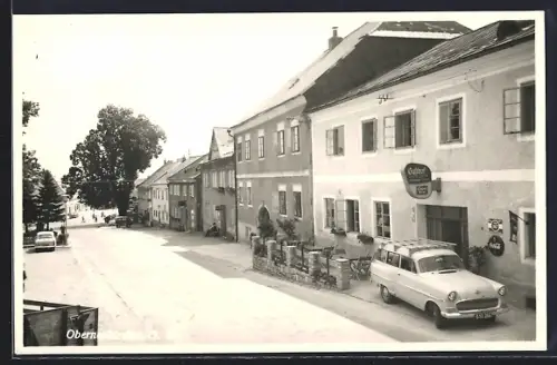 AK Oberneukirchen /O. Oe., Gasthof Eckerstorfer mit Strassenpartie und Autos