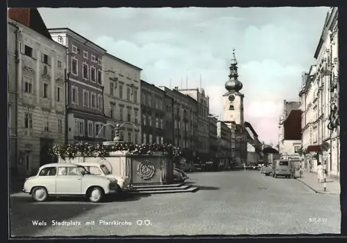 AK Wels /O. Ö., Stadtplatz mit Brunnen und Pfarrkirche