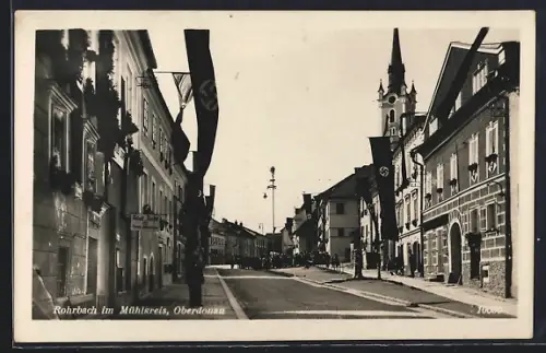 AK Rohrbach im Mühlkreis, Strassenpartie und Blick auf die Kirche, Tabak-Geschäft Trafik, -Fahne