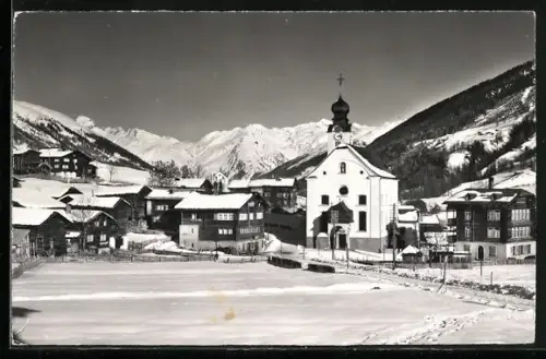 AK Reckingen im Goms, Ortspanorama im Winter, mit Kirche, Galenstock, Furkapass u. Muttenhörner
