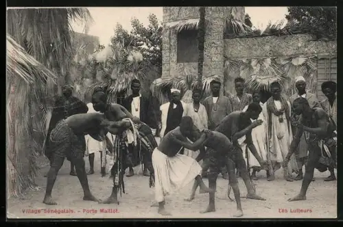 AK Senegaldorf in einer Ausstellung mit jungen Männern beim Ringkampf