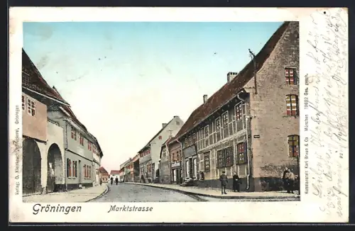 Goldfenster-AK Gröningen / Magdeburg, Marktstrasse mit leuchtenden Fenstern