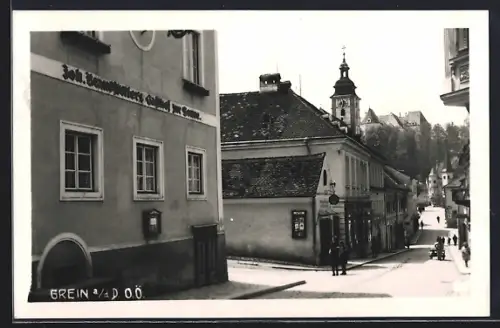 AK Grein a. d. D., Gasthof zur Sonne mit Strasse und Türmen