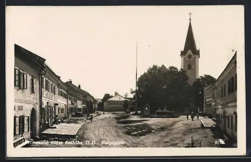 AK Hellmonsödt /O. D., Hauptplatz mit Kirche und Geschäft Egger