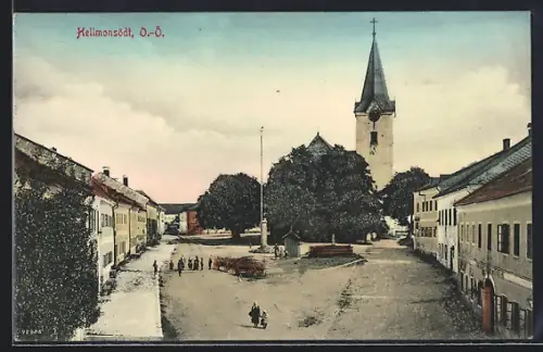 AK Hellmonsödt /O.-Ö., Kirche mit Strassenpartie