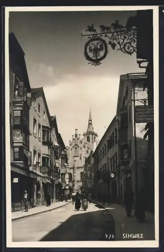 AK Schwaz, Strassenpartie mit Gasthaus und Geschäften