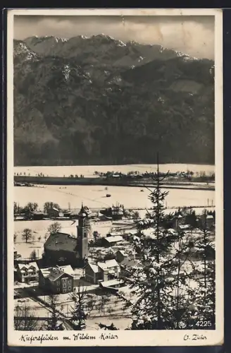 AK Kiefersfelden, Totalansicht im Winter mit Wildem Kaiser