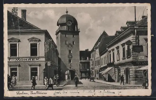 AK Leoben, Strasse mit Stadtturm und Hotel zum Mohren