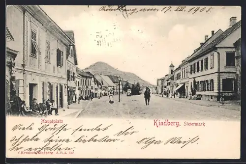 AK Kindberg, Hauptplatz mit Geschäften und Passanten