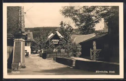 AK Mürzhofen, Ortspartie mit Geschäftshaus von Emmerich Kwacik