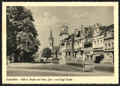 AK Euskirchen, Kölner Strasse mit Herz-Jesu und Evgl. Kirche