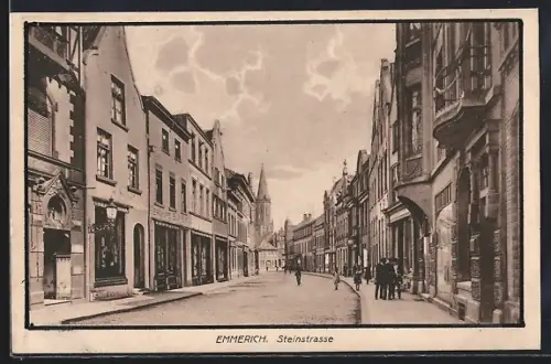 AK Emmerich, Steinstrasse mit Geschäften und Turm