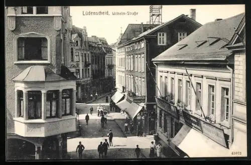 AK Lüdenscheid, Wilhelm-Strasse, Blumengeschäft Kümmel & Ganzer, Cigarrengeschäft Oelsterhaus