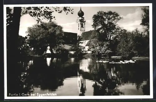 AK Gern in Eggenfelden, Blick zur Kirche am Ufer
