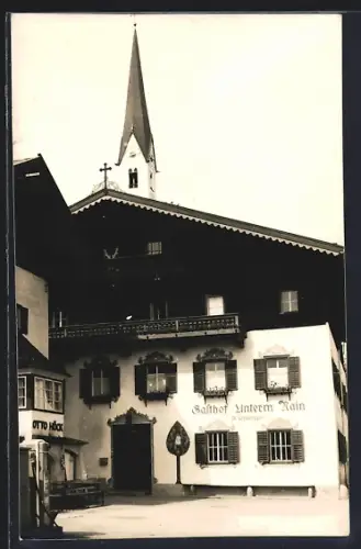AK Kirchberg / Tirol, Gasthof Unterm Rain in der Dorfstrasse, Inh. A. Schwaiger, Tanksäule