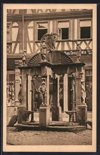 AK Wertheim / Main, Engelsbrunnen mit Geschäften im Hintergrund
