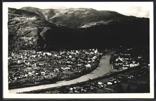 AK Rachov, v pozadi Dumen