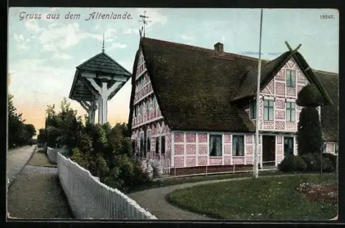 AK Altenlande, Fachwerkhaus und Glockenturm