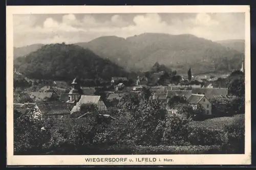 AK Wiegersdorf i. Harz, Ortsansicht mit Kirche und umliegenden Bergen