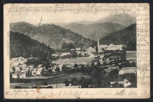 AK Ilfeld a. Harz, Ortsansicht mit Kirche und umliegenden Bergen