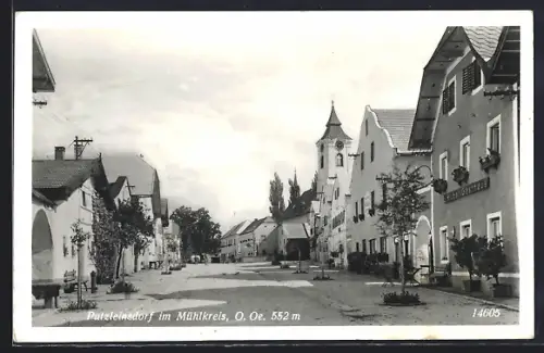 AK Putzleinsdorf im Mühlkreis, Strassenpartie mit Gasthaus Huber u. Turm