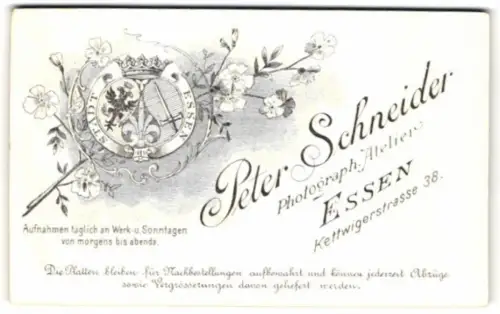 Fotografie Peter Schneider, Essen, Kettwigerstrasse 38, Stadtwappen von Essen mit blumiger Verzierung