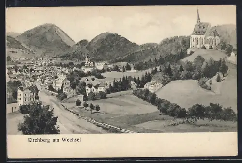 AK Kirchberg am Wechsel, Ortsansicht mit Kirche und umliegenden Bergen