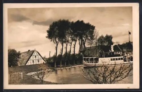 AK Jork, Am Hafen, Fachwerkhaus, Dampfer