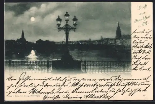 AK Frankfurt a. M., Mainufer, Brücke, Stadtansicht bei Nacht