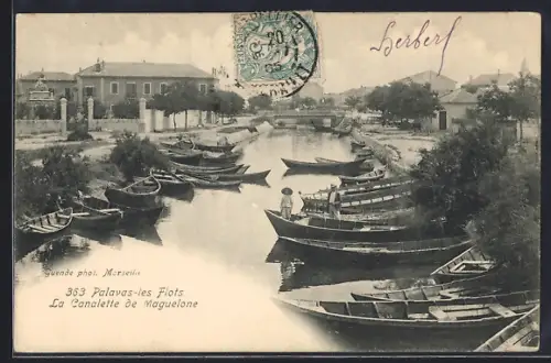 AK Palavas-les-Flots, La Canalette de Maguelone avec barques et arbres en bordure