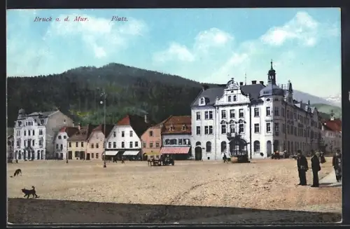 AK Bruck a.d. Mur, Platzpartie mit Leuten & Geschäften