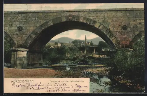 AK Mürzzuschlag, Durchblick durch einen Rundbogen auf die Heilandskirche