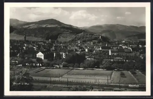 AK Bruck a. d. Mur, Ortsansicht mit Beetanlage und Fernblick