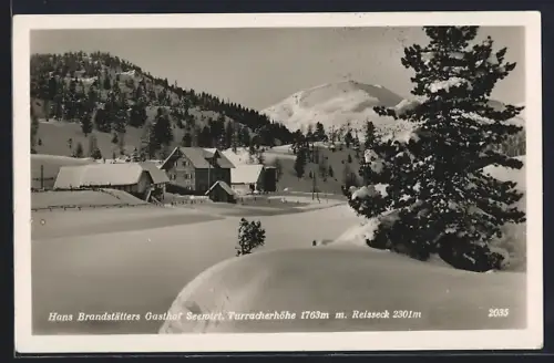 AK Turrach, Turracherhöhe, Gasthof Seewirt H. Brandstätter mit Reisseck im Winter