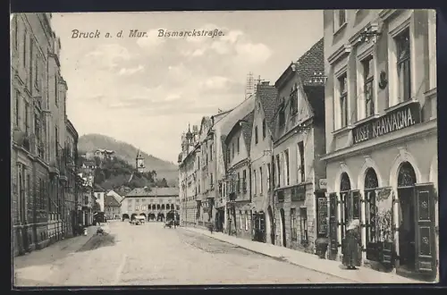 AK Bruck a. d. Mur, Bismarckstrasse mit Geschäft von Josef Krawacna