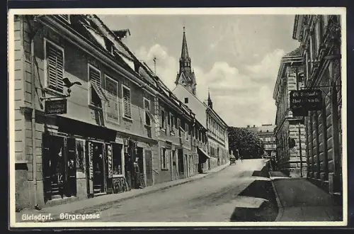 AK Gleisdorf, Blick in die Bürgerstrasse mit Geschäften