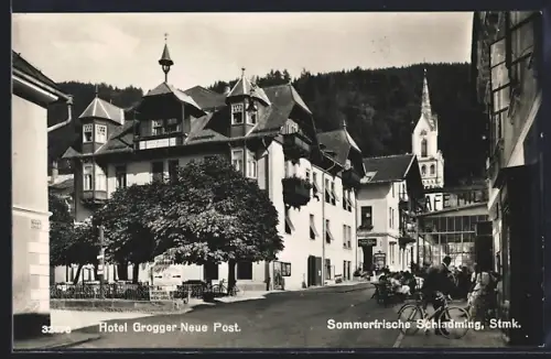 AK Schladming, Hotel Grogger Neue Post u. Café Mill, Strassenpartie