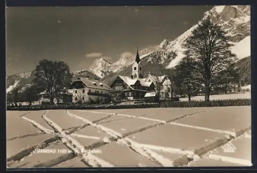 AK Ramsau / Schladming, Ortsansicht mit Kirche und Dachstein im Winter