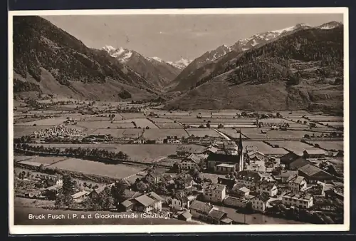 AK Bruck Fusch i. P., Ortsansicht mit Bergpanorama