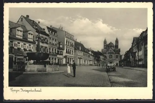 AK Speyer, Strassenpartie mit Geschäft und Kriegerdenkmal