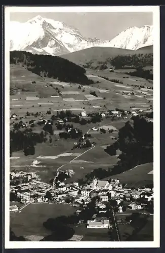 AK Megève, Vue générale et le Mont-Blanc en arrière-plan