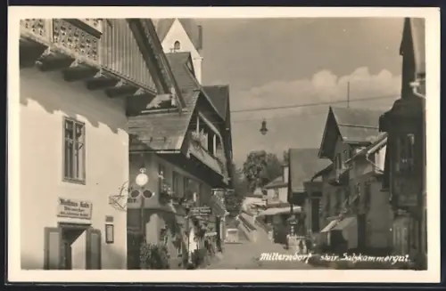 AK Mitterndorf / Salzkammergut, Strassenpartie mit Geschäften im Sonnenschein