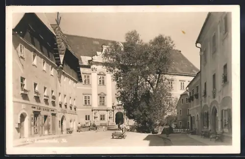 AK St. Lambrecht, Strassenansicht mit Geschäft Hans Ronirer