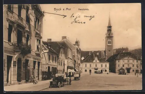 AK Bruck a. Mur, Hauptplatz mit Geschäften und Auto