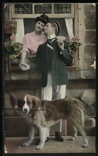 AK Student mit Mädchen und Hund an einem Fenster