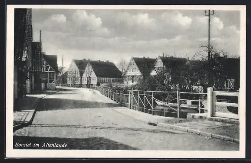 AK Borstel im Altenlande, Strassenansicht mit Fachwerkhäusern und Brücke