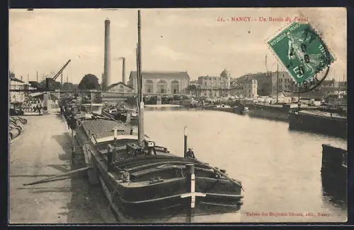 AK Nancy, Un bassin du canal avec péniches et bâtiments industriels