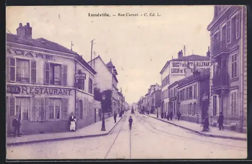 AK Lunéville, Rue Carnot avec restaurants et boutiques